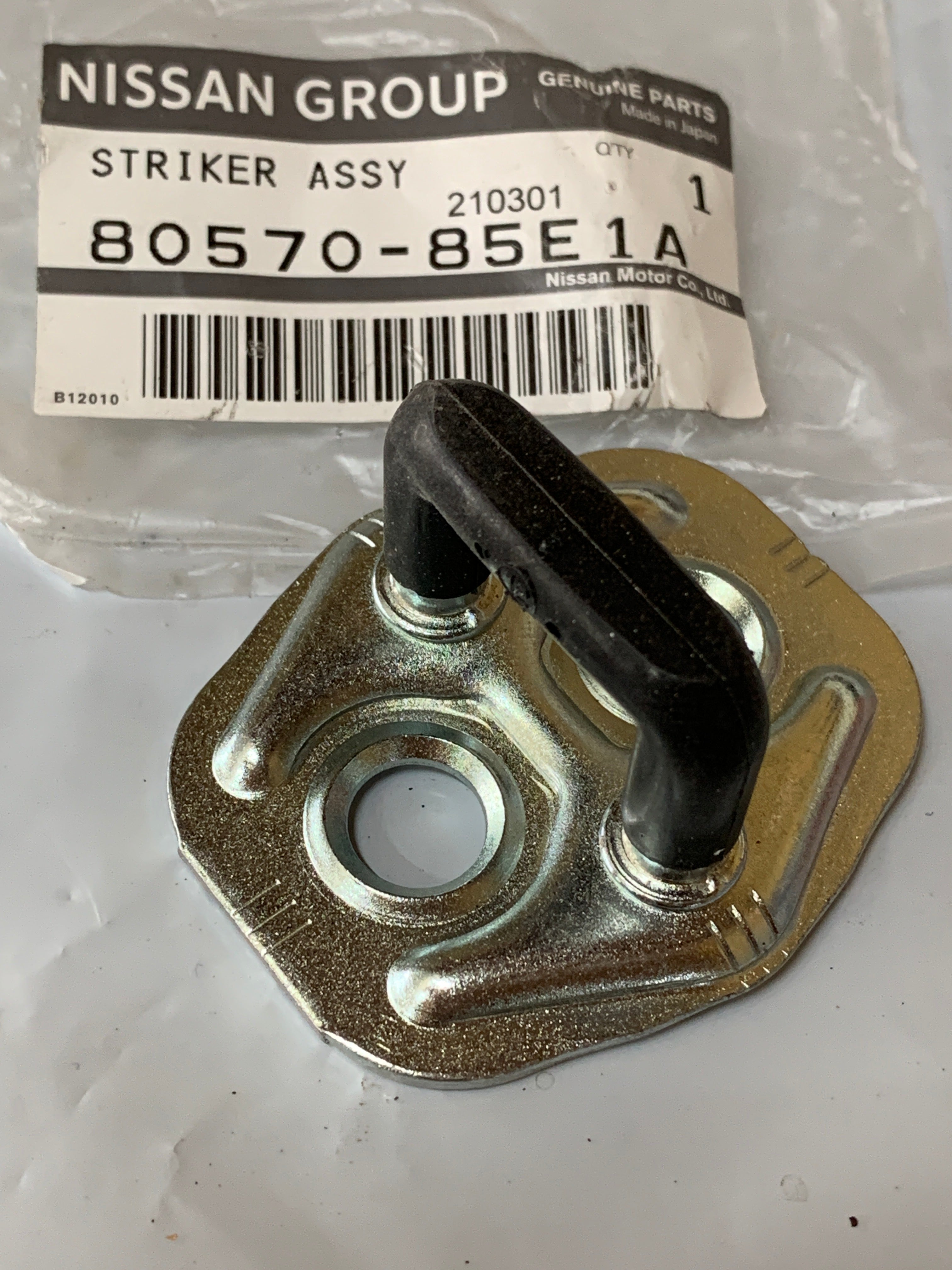 NEW Genuine Door Striker, R32