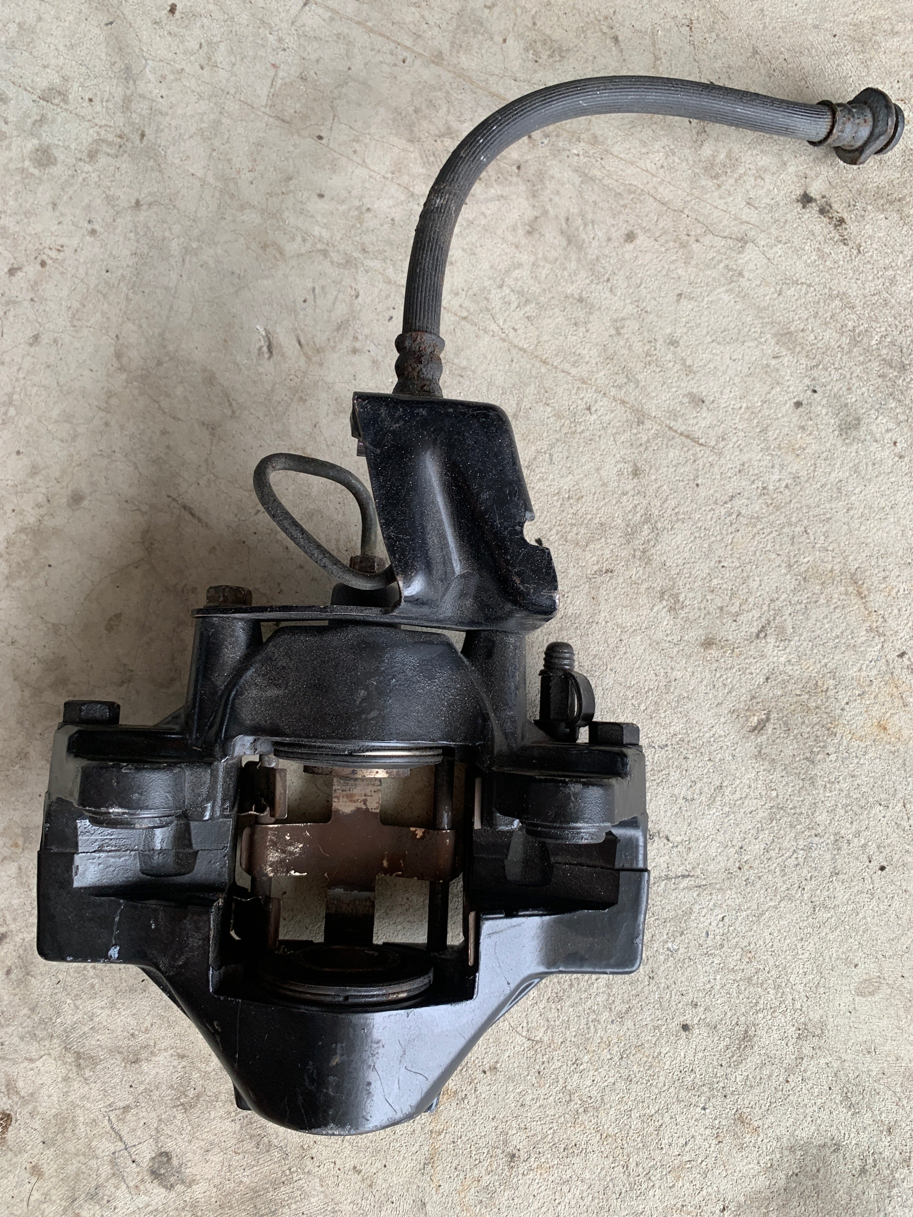 LEFT Rear Brake Caliper, R32