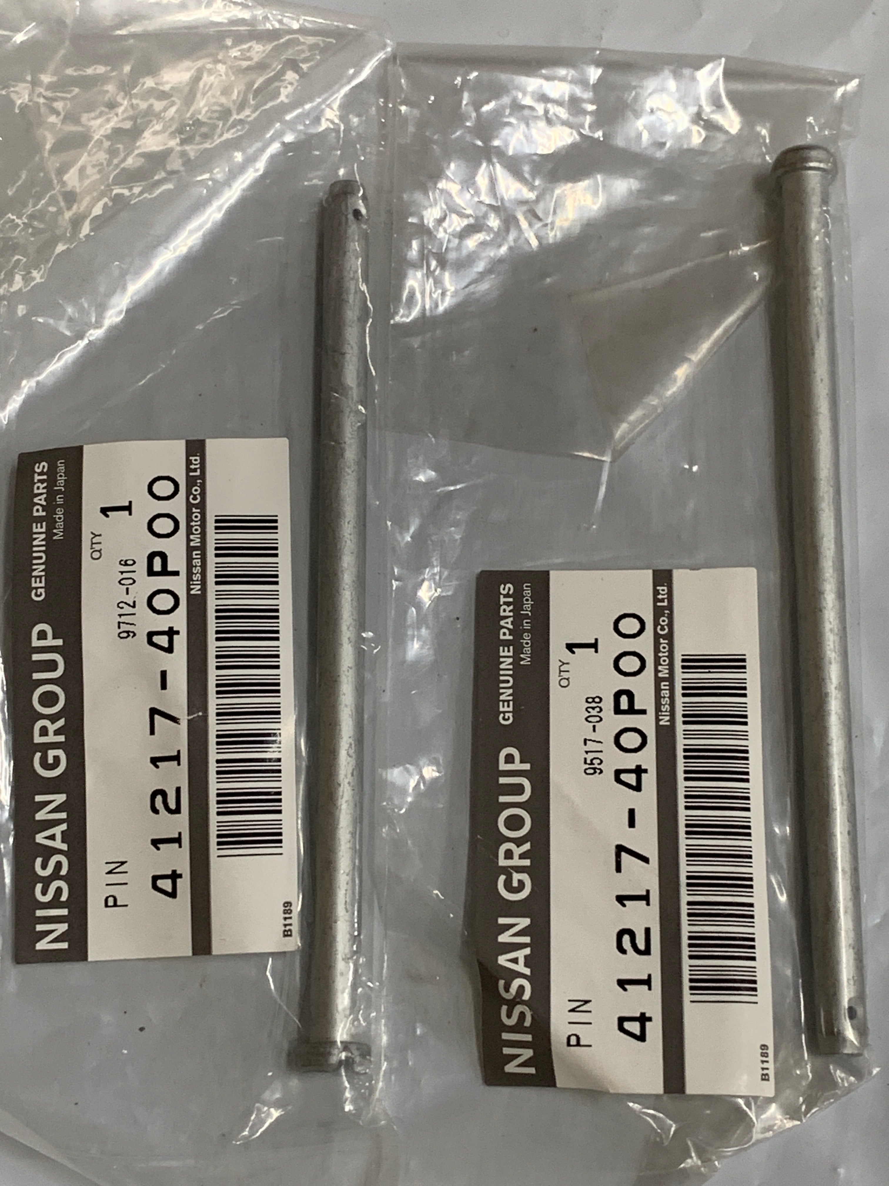 NEW Genuine Front Brake Caliper Pins, R32 Sumitomo