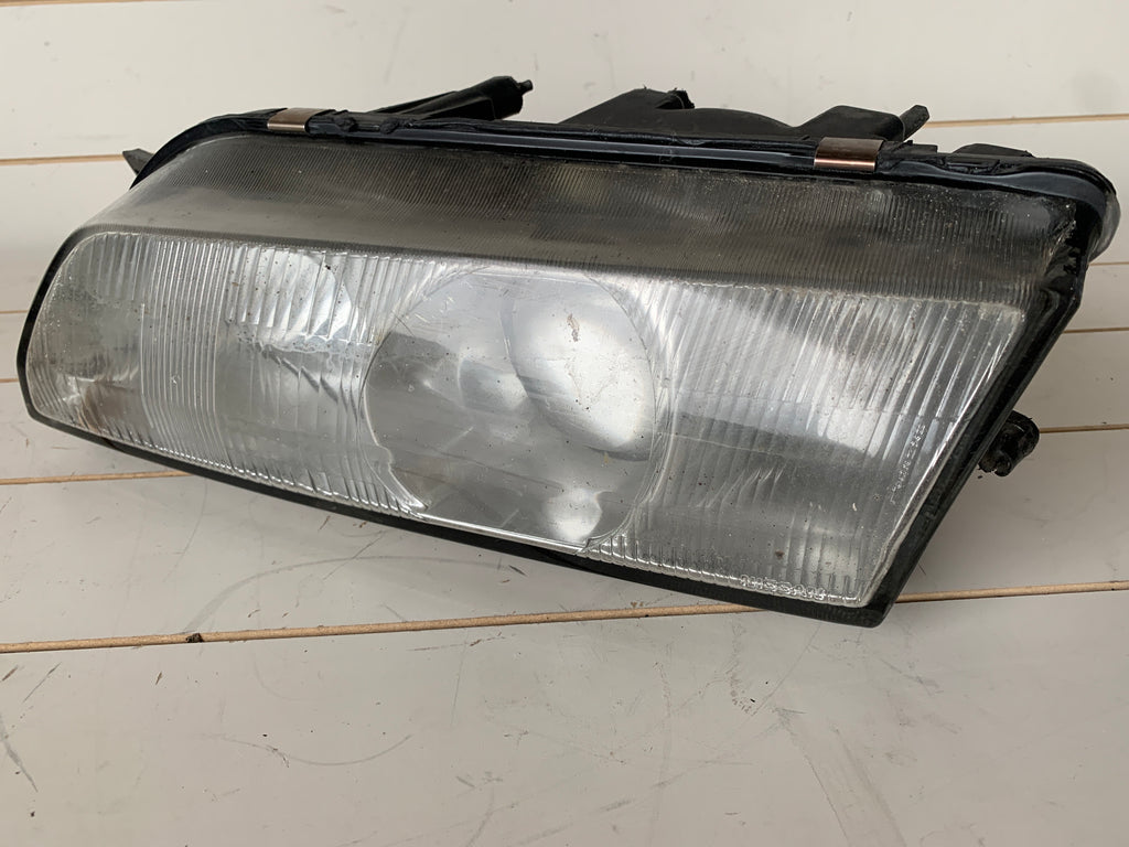LEFT Head Light (damaged), R32
