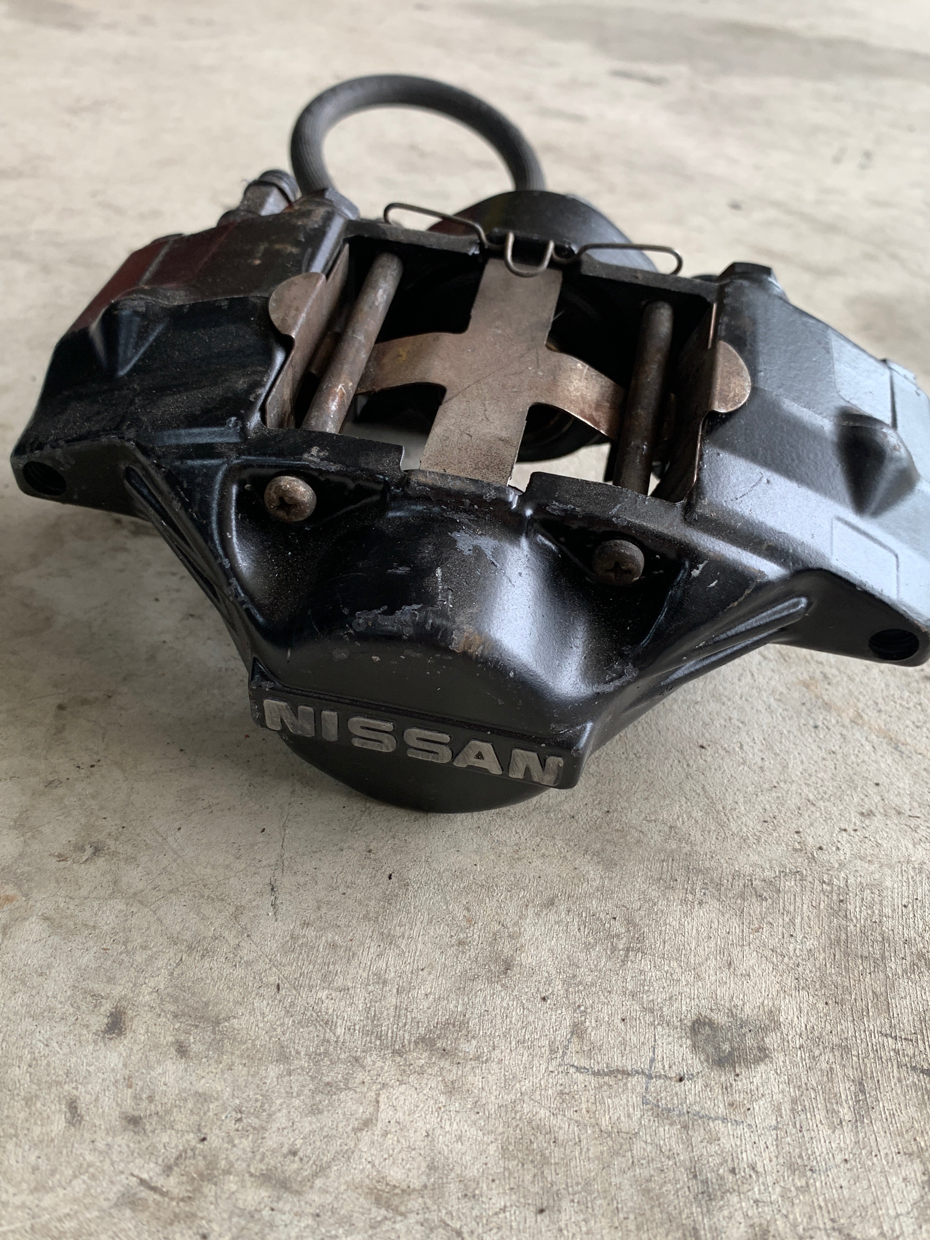 LEFT Rear Brake Caliper, R32