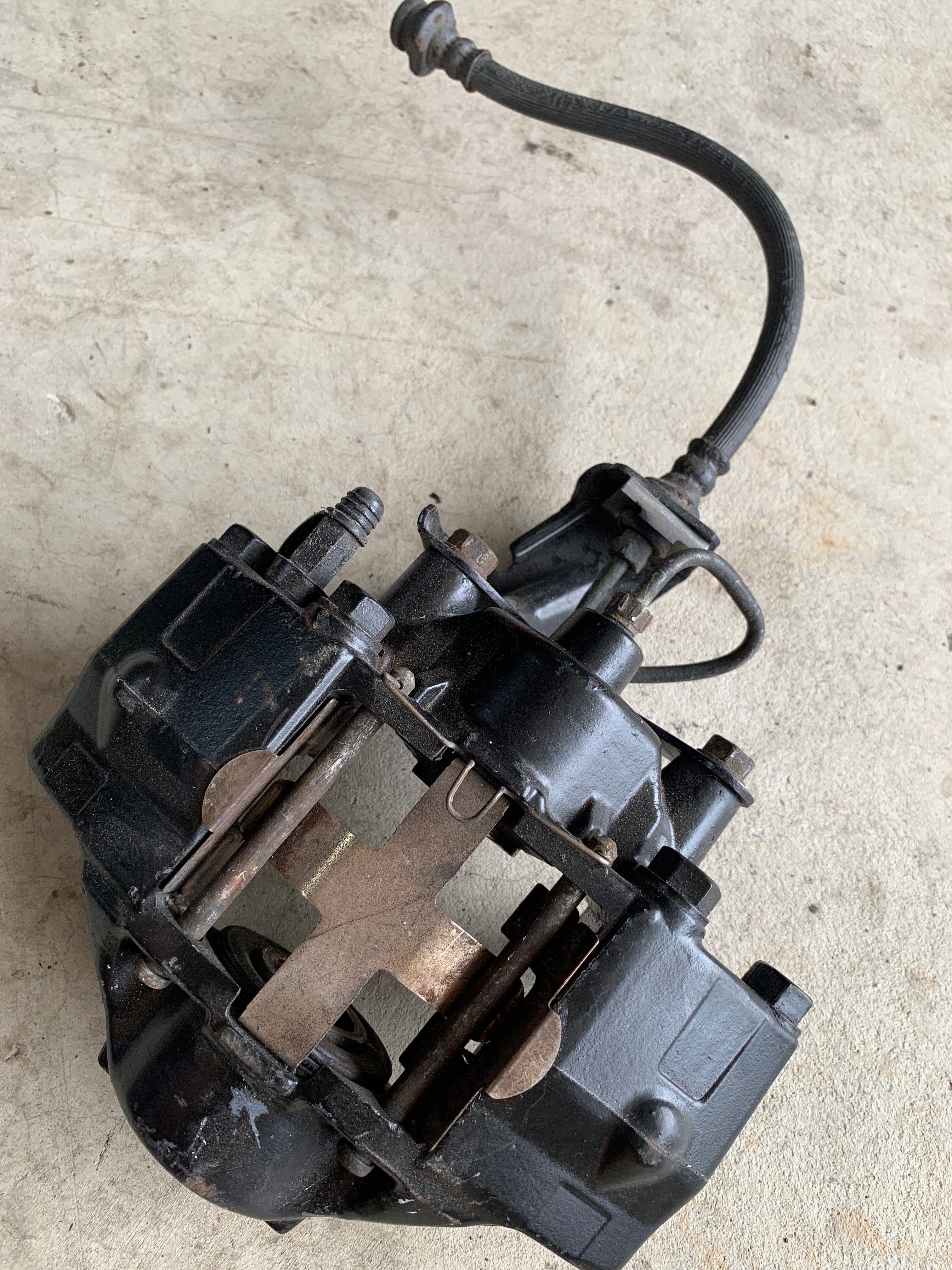 LEFT Rear Brake Caliper, R32